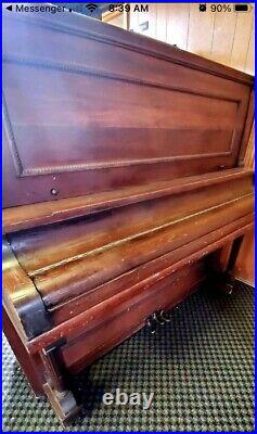Upright Tiffany piano Antique