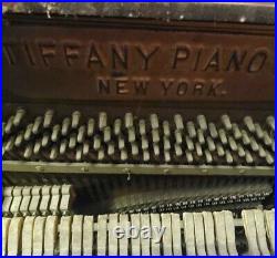 Upright Tiffany piano Antique