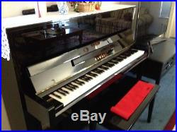 Upright console piano