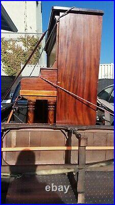Upright piano used working perfectly about 6ft long and 5ft tall