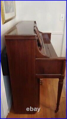 Wurlitzer upright piano (1987) Cherry wood finish. Condition is Used. $780.00