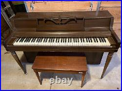 Wurlitzer upright piano with bench. Good condition
