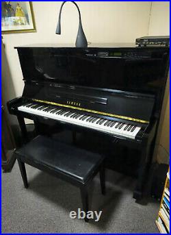 Yamaha Disklavier upright player piano
