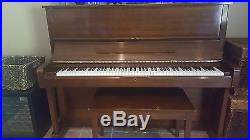 Yamaha upright piano with bench. Excellent condition