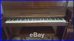 Yamaha upright piano with bench. Excellent condition